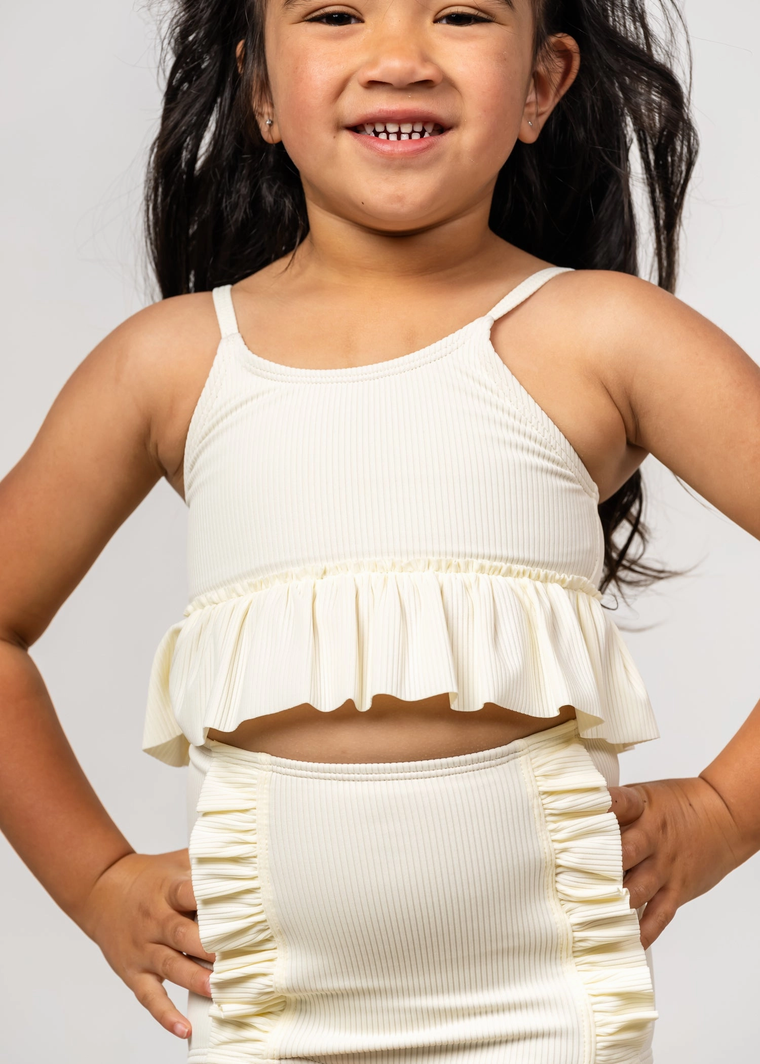 Ribbed Ivory | Mini Peplum Top